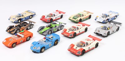 Lot 854 - 11 various unboxed Scalextric slot cars mainly...