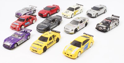 Lot 856 - 11 various unboxed Scalextric slot cars to...