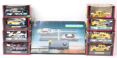 Lot 860 - Scalextric slot cars boxed group of 8 various...