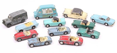 Lot 1318 - Spot On models group of 12 play worn models to...