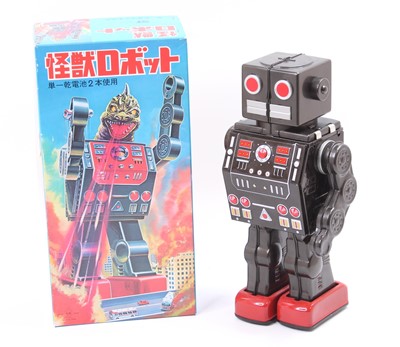 Lot 878 - RM Toys Reproduction boxed Dino Robot, based...