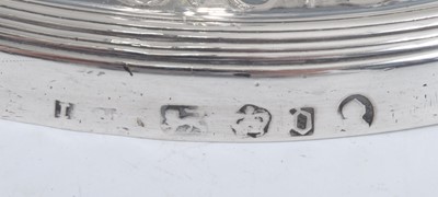 Lot 1065 - A pair of George III silver loaded...
