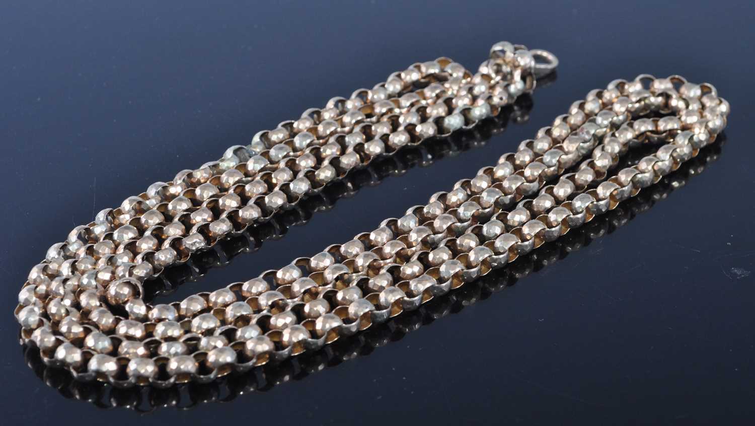 Lot 1220 - A Victorian yellow metal belcher link guard...