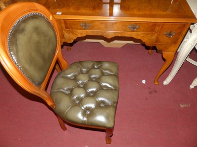 Lot 1222 - A contemporary figured walnut three drawer...