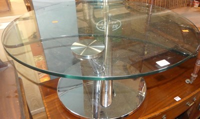 Lot 1289 - A contemporary Italian heavy glass topped and...