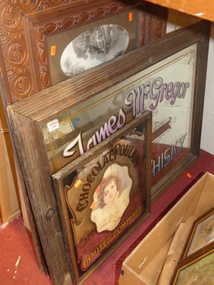 Lot 1081 - An oak framed advertising wall mirror for...