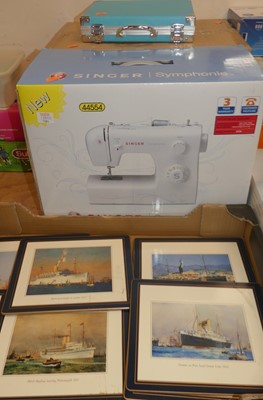 Lot 1404 - A boxed Singer Symphony sewing machine,...