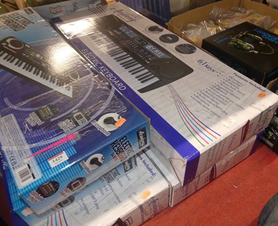 Lot 1429 - Five various boxed electronic keyboards and a...