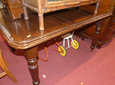 Lot 1355 - A Victorian mahogany round cornered extending...