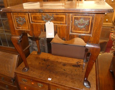 Lot 1357 - A walnut and satin wood inlaid three drawer...