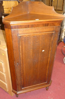 Lot 1373 - A circa 1900 oak ledgeback single door corner...