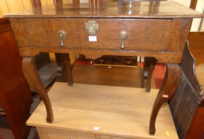 Lot 1374 - An 18th century provincial oak single drawer...