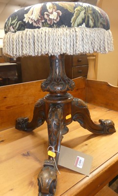 Lot 1389 - A mid-Victorian floral carved mahogany...