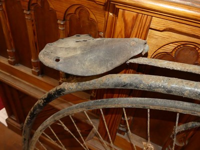 Lot 1125 - An antique wrought iron framed penny farthing...