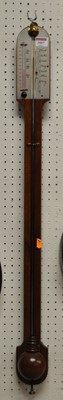 Lot 2007 - A mahogany round top open front inlaid stick...