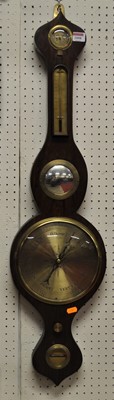Lot 2008 - A rosewood five-dial onion topped wheel...