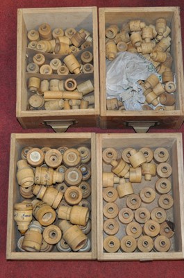 Lot 2060 - A collection of boxwood cisterns in various...