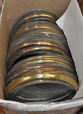 Lot 2075 - A collection of principally glazed 8" brass...