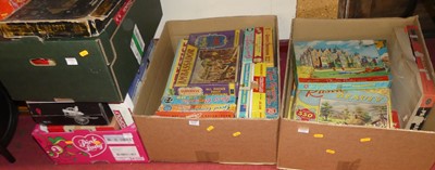 Lot 1632 - Four boxes of jigsaws and board games, to...
