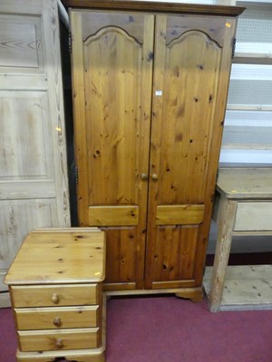 Lot 1164 - A modern pine double door wardrobe, w.91cm;...