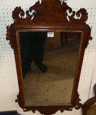 Lot 1175 - An early 20th century figured walnut fret-cut...