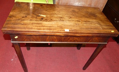 Lot 1279 - A George III mahogany fold-over tea table,...