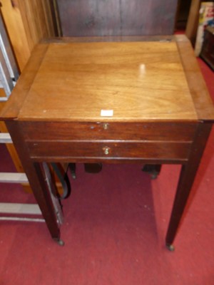 Lot 1307 - An early 20th century mahogany slopefront...