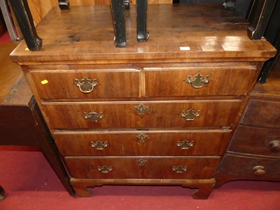 Lot 1309 - A mid-18th century provincial walnut chest of...
