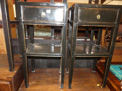 Lot 1311 - A pair of contemporary Oriental black painted...