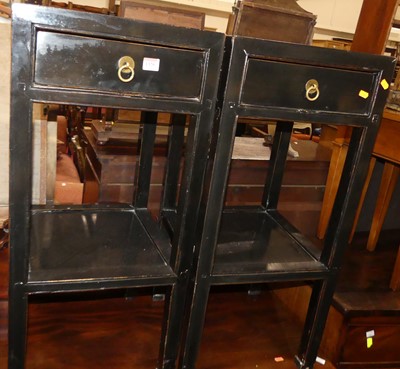 Lot 1320 - A pair of contemporary Oriental black painted...