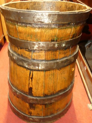 Lot 1322 - A stained and metal bound oak cylindrical...