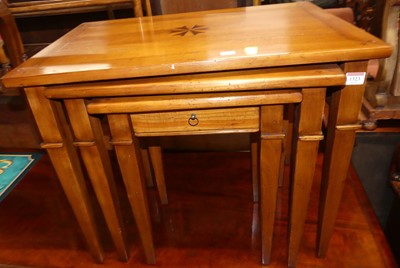 Lot 1323 - A contemporary joined cherry wood nest of...