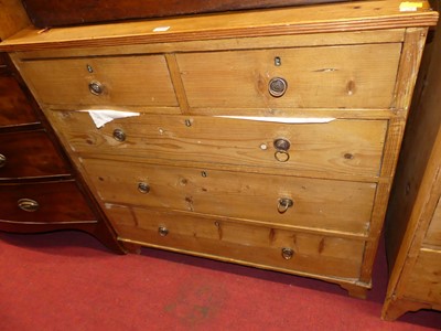 Lot 1326 - A 19th century rustic pine chest of two short...