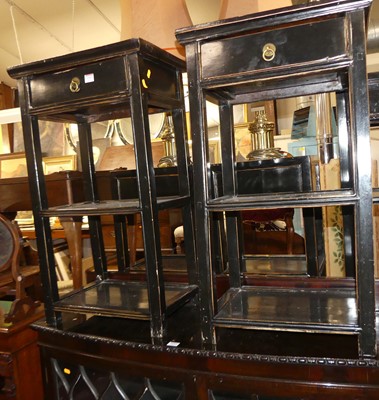 Lot 1353 - A pair of contemporary Oriental black painted...