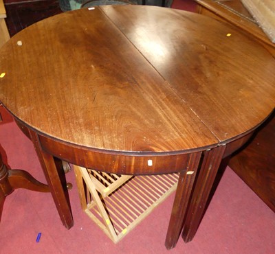 Lot 1358 - An early 19th century D-end dining table, with...