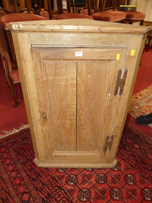 Lot 1360 - A 19th century pine single door hanging corner...