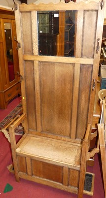 Lot 1371 - An early 20th century panelled oak and...