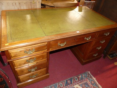 Lot 1375 - A circa 1900 walnut and gilt-tooled green...