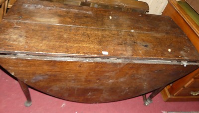 Lot 1379 - An 18th century joined oak dropleaf dining table