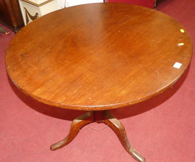 Lot 1384 - A 19th century mahogany circular tilt-top...