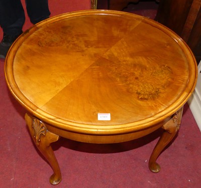 Lot 1389 - A 1930s figured walnut low circular occasional...