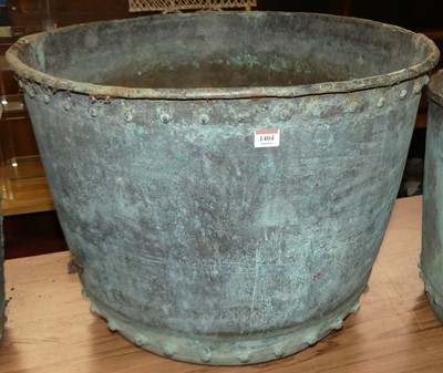 Lot 1404 - A large circa 1900 riveted copper circular log...