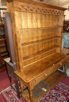 Lot 1410 - A rustic stained pine round cornered kitchen...