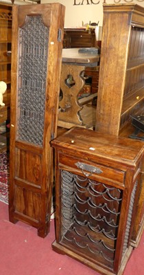 Lot 1419 - A contemporary Eastern hardwood and iron inset...
