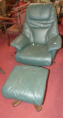 Lot 1428 - A contemporary faux green leather swivel...