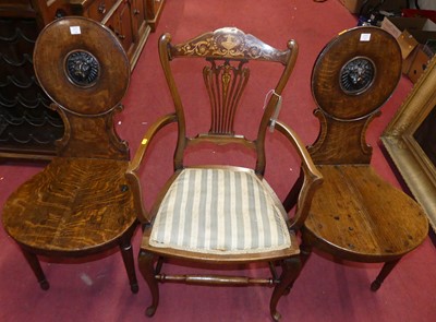 Lot 1429 - A pair of Regency oak panelled seat hall...