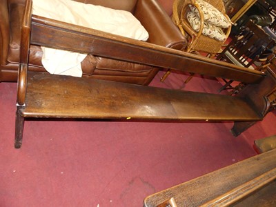 Lot 1434 - A late Victorian oak long church pew, with...