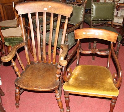 Lot 1452 - An early 20th century elm and fruitwood slat...