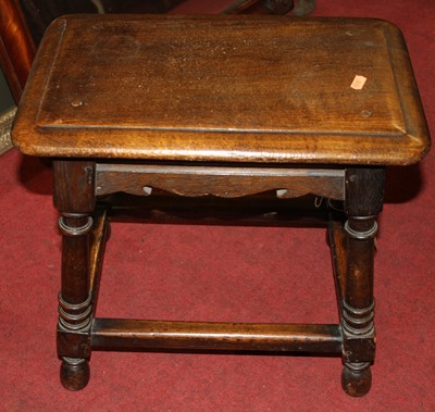 Lot 1463 - A joined oak joint stool, on turned and square...