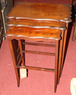 Lot 1467 - An early 20th century mahogany shaped nest of...